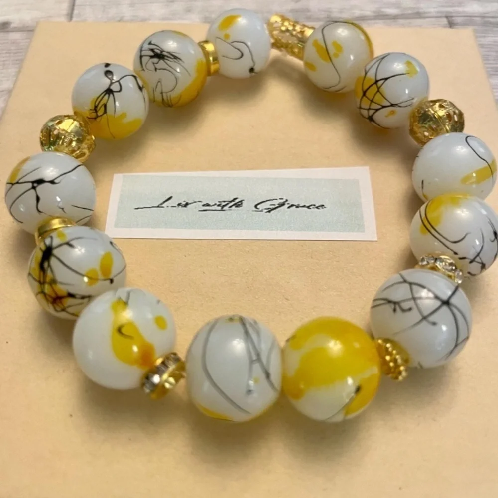 White & Black with yellow and gold accents 13mm beads gorgeous stretch bracelet - Picture 2 of 4